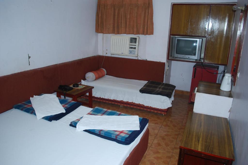 Charans Guest House Lakhnaú Pokoj fotografie